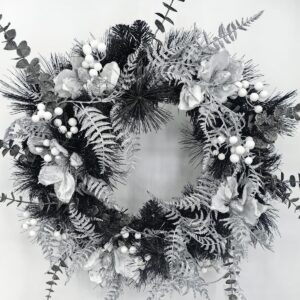 24" black mixed pine wreath with silver fern and mognolia & berries