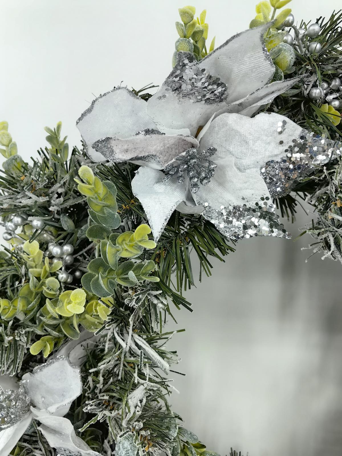 24" snowy wreath with silver poinsettia & eucalyptus 24" snowy wreath with silver poinsettia & eucalyptus