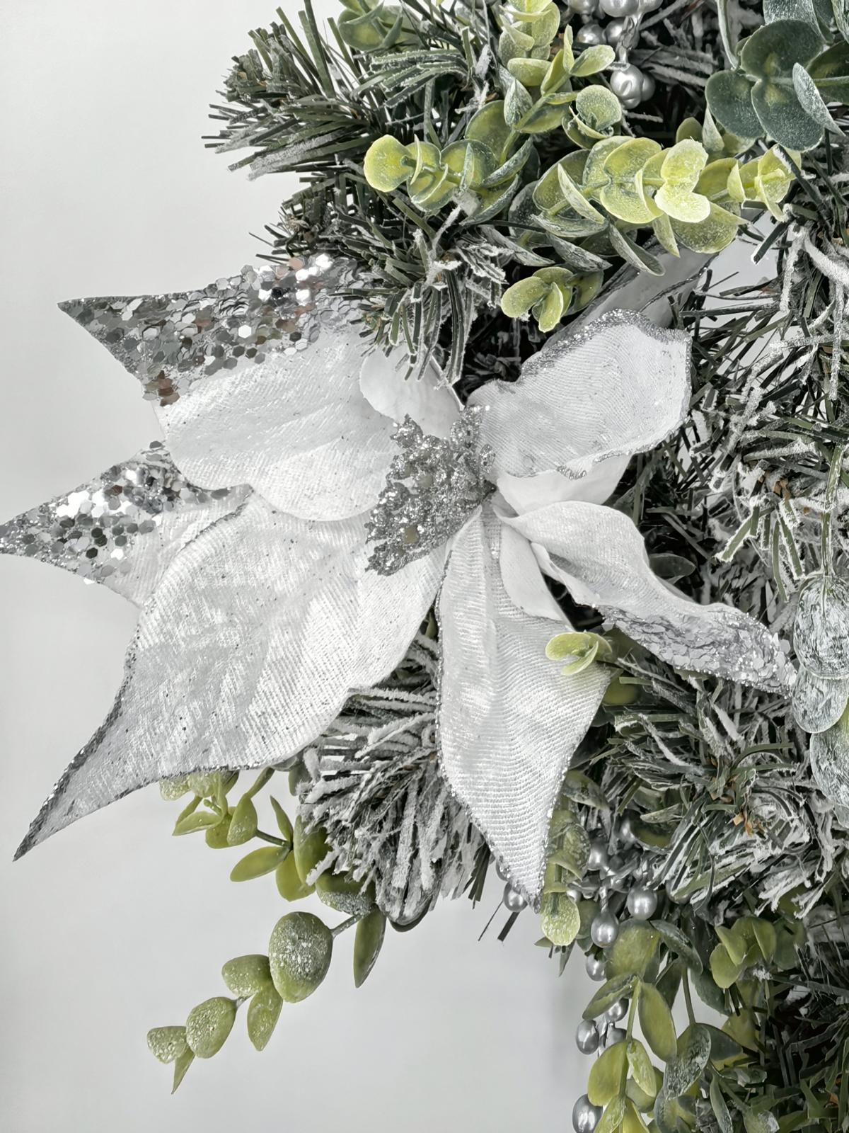 24" snowy wreath with silver poinsettia & eucalyptus 24" snowy wreath with silver poinsettia & eucalyptus