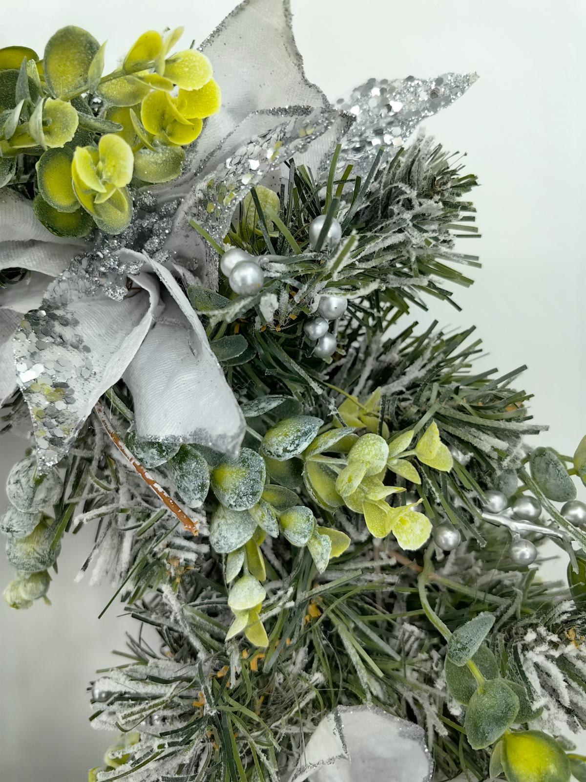 24" snowy wreath with silver poinsettia & eucalyptus 24" snowy wreath with silver poinsettia & eucalyptus
