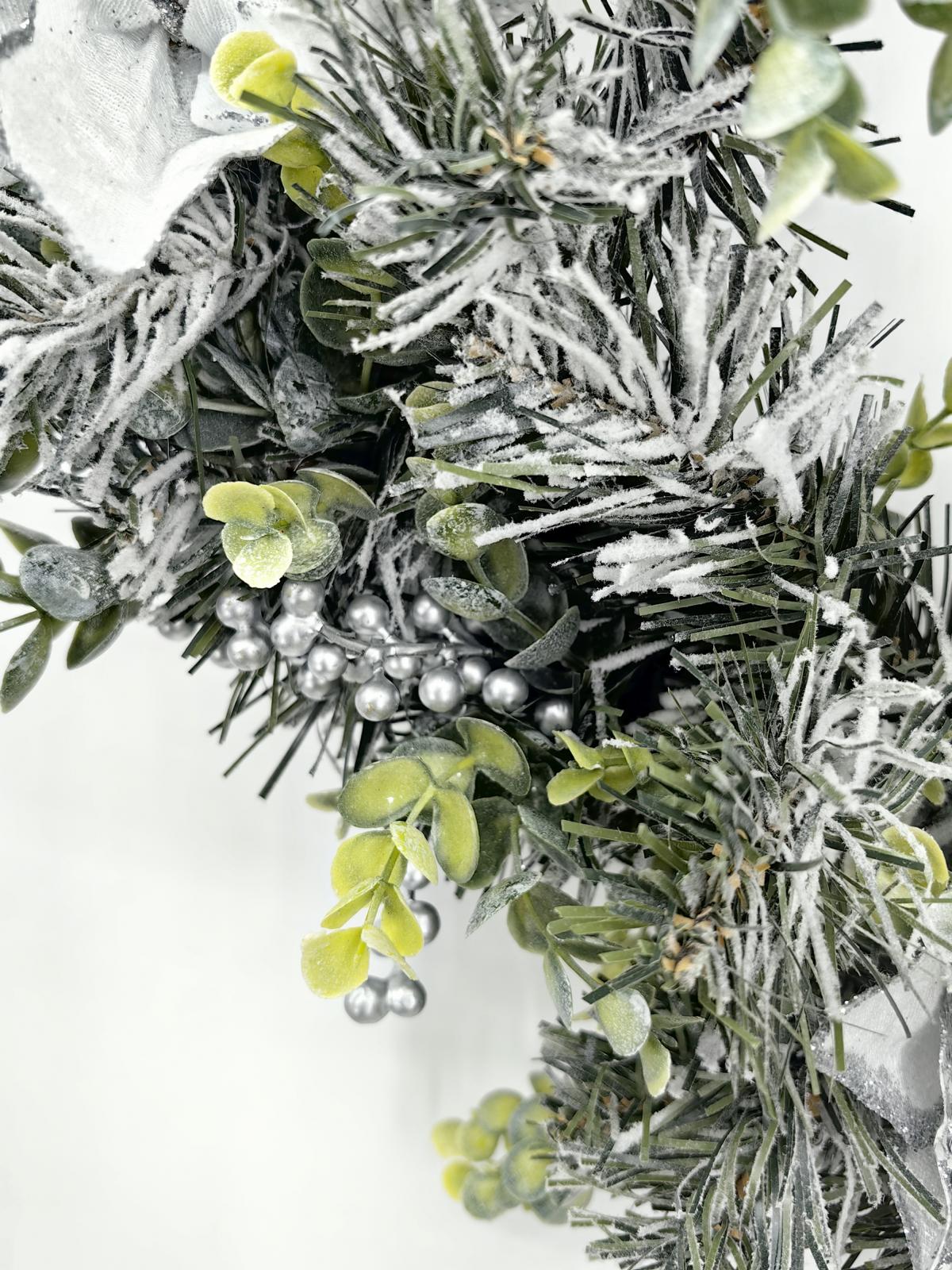 24" snowy wreath with silver poinsettia & eucalyptus 24" snowy wreath with silver poinsettia & eucalyptus