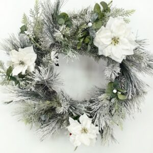 24" long snow needle pine wreath with poisettia flowers