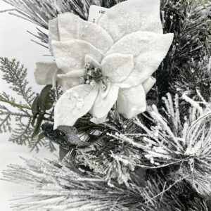 24" long snow needle pine wreath with poisettia flowers