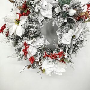 24" snowy wreath with poinsettia & red berries